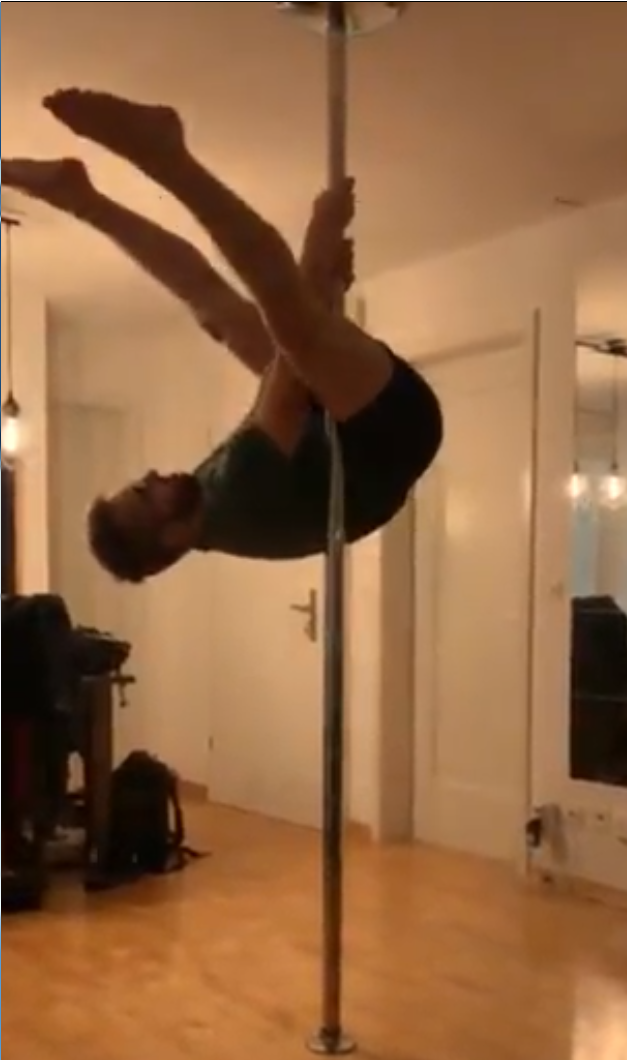 Syd trying a pole-dancing move